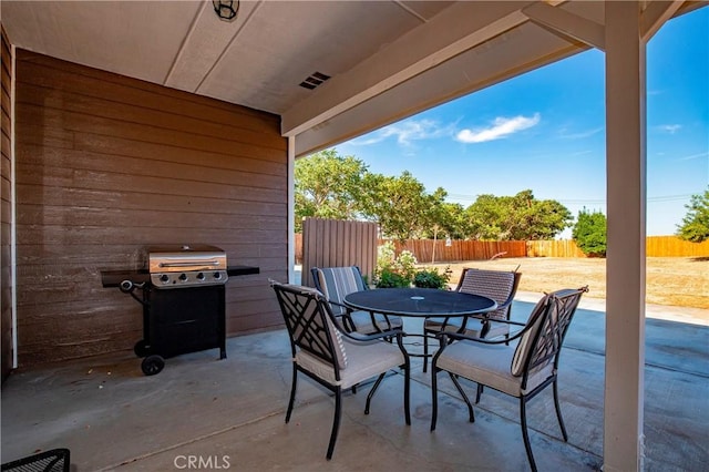 33430 133rd St E, Pearblossom, CA 93553 - fenced backyard with a patio, outdoor dining area, and area for grilling