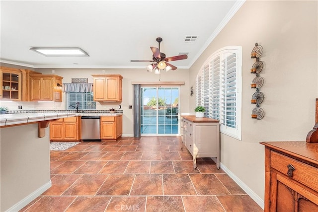 33430 133rd St E, Pearblossom, CA 93553 - kitchen with dishwasher, ornamental molding, tile countertops, glass insert cabinets, and a ceiling fan