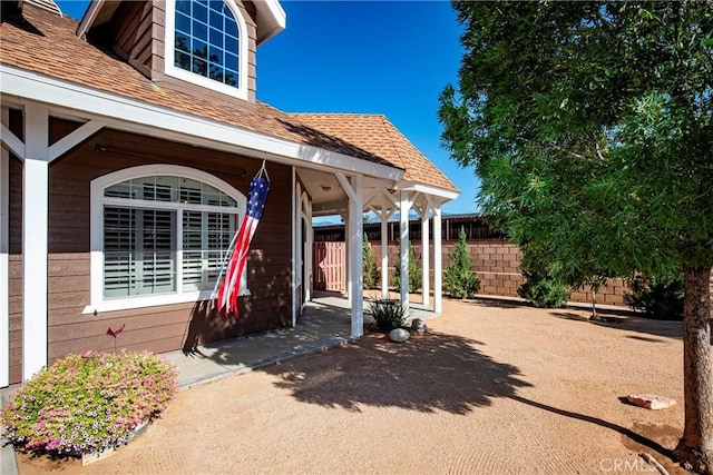 33430 133rd St E, Pearblossom, CA 93553 - view of exterior entry featuring a shingled roof