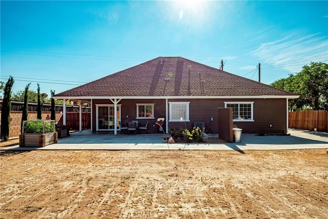 33430 133rd St E, Pearblossom, CA 93553 - rear view of property featuring a patio area, a fenced backyard, and roof with shingles