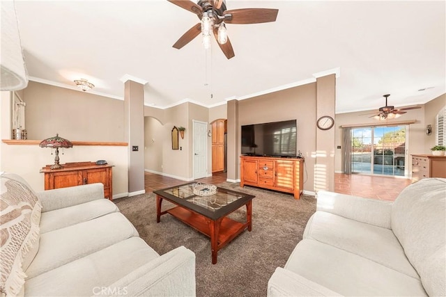 33430 133rd St E, Pearblossom, CA 93553 - carpeted living room featuring ceiling fan, arched walkways, and crown molding