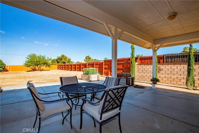 33430 133rd St E, Pearblossom, CA 93553 - fenced backyard featuring a patio and outdoor dining space