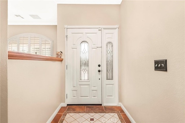 33430 133rd St E, Pearblossom, CA 93553 - foyer entrance featuring tile patterned floors and crown molding