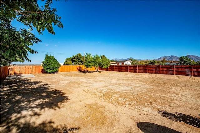33430 133rd St E, Pearblossom, CA 93553 - fenced backyard with a mountain view