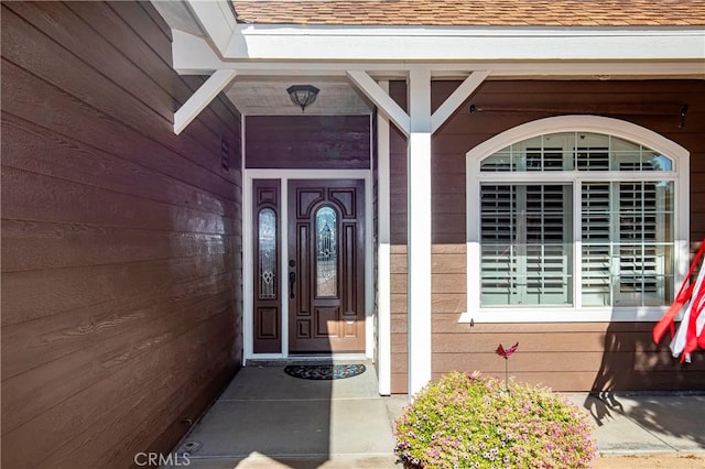 33430 133rd St E, Pearblossom, CA 93553 - doorway to property featuring a shingled roof and a porch