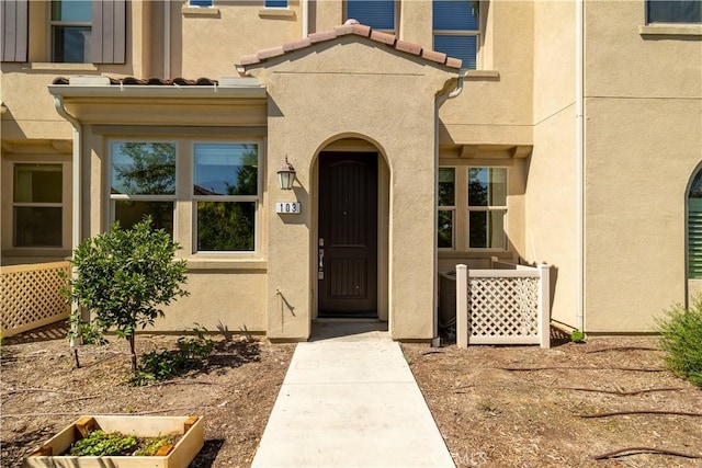 4271 Horvath St Unit 103, Corona, CA 92883 - doorway to property featuring stucco siding