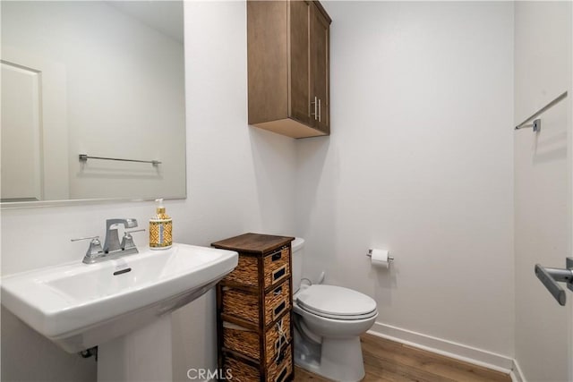 4271 Horvath St Unit 103, Corona, CA 92883 - half bath with wood finished floors and toilet