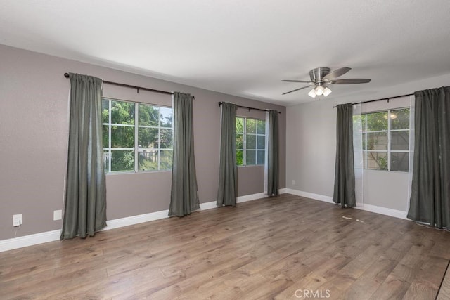 4356 Gardena Dr, Riverside, CA 92506 - spare room featuring healthy amount of natural light, light wood-type flooring, and a ceiling fan