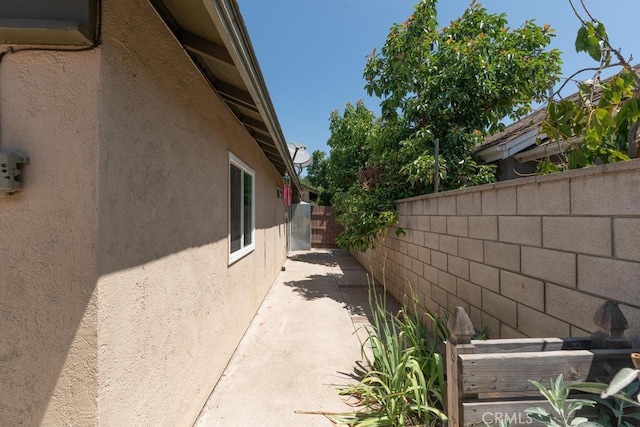 4356 Gardena Dr, Riverside, CA 92506 - view of side of home featuring stucco siding