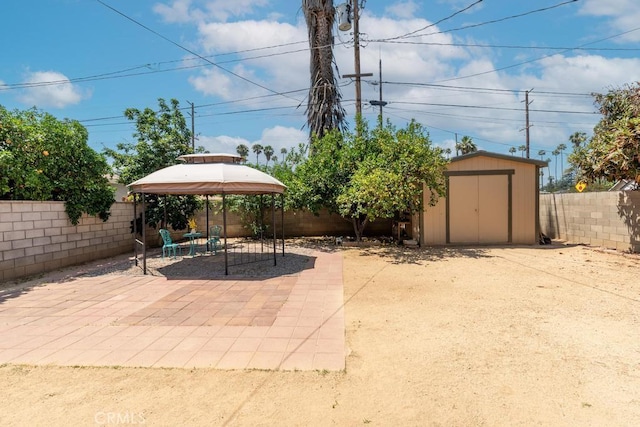 4356 Gardena Dr, Riverside, CA 92506 - fenced backyard featuring a gazebo, a shed, and a patio area