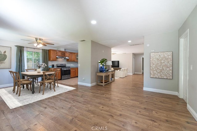 4356 Gardena Dr, Riverside, CA 92506 - dining area featuring light wood-type flooring, ceiling fan, and recessed lighting