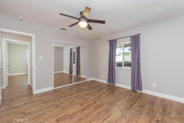 4356 Gardena Dr, Riverside, CA 92506 - unfurnished bedroom featuring light wood finished floors, a closet, and ceiling fan