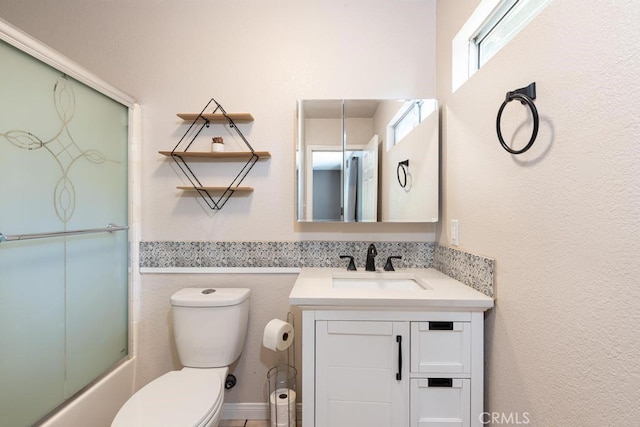 4356 Gardena Dr, Riverside, CA 92506 - full bathroom featuring vanity and shower / bath combination with glass door