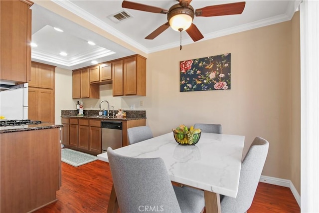 1469 Forest Glen Dr Unit 193, Hacienda Heights, CA 91745 - dining space with ornamental molding, dark wood-style flooring, a ceiling fan, recessed lighting, and a raised ceiling