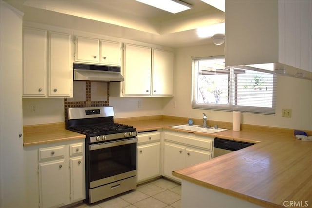 18107 Sycamore St, Hesperia, CA 92345 - kitchen with appliances with stainless steel finishes, under cabinet range hood, white cabinets, and light countertops