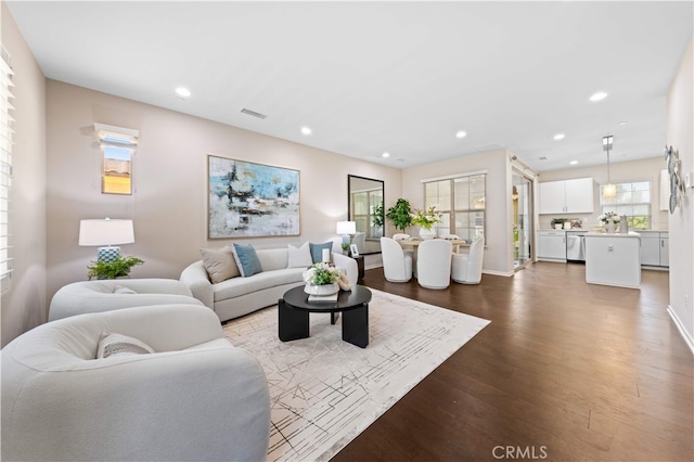 53 Bay Laurel, Irvine, CA 92620 - living room featuring recessed lighting and dark wood-style floors