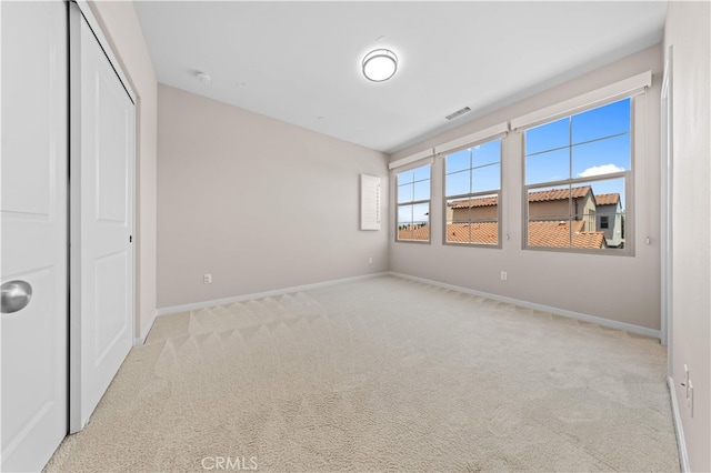 53 Bay Laurel, Irvine, CA 92620 - unfurnished bedroom with light colored carpet and a closet