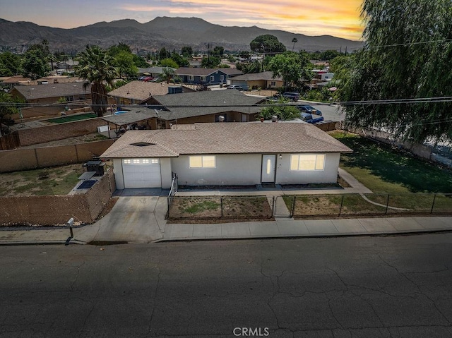 149 S Mistletoe Ave, San Jacinto, CA 92583 - aerial view at dusk of a mountain view and a residential view