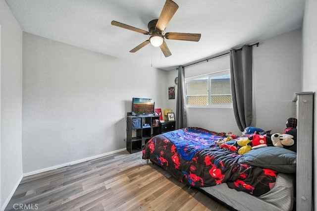 149 S Mistletoe Ave, San Jacinto, CA 92583 - bedroom featuring wood finished floors and a ceiling fan
