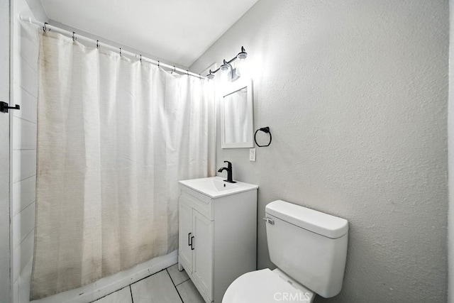 149 S Mistletoe Ave, San Jacinto, CA 92583 - bathroom with vanity, tile patterned flooring, and a textured wall