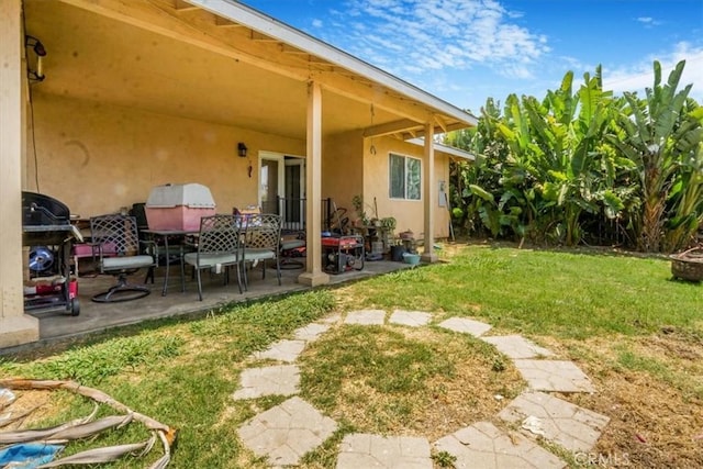 9130 Hargill, Bellflower, CA 90706 - view of grassy yard featuring a patio