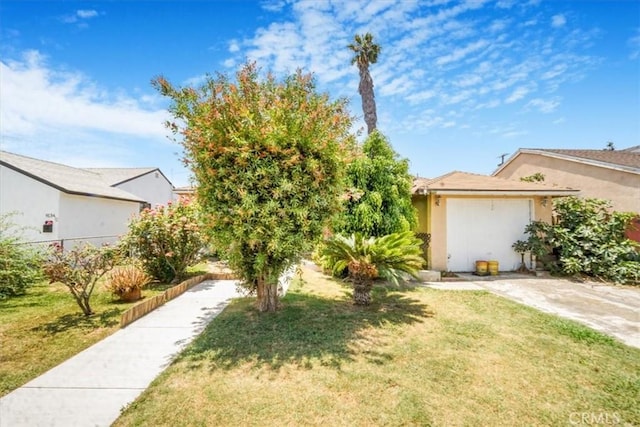 9130 Hargill, Bellflower, CA 90706 - view of front of home with a front lawn and stucco siding