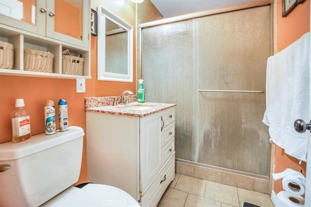 9130 Hargill, Bellflower, CA 90706 - bathroom featuring a stall shower, vanity, and tile patterned floors