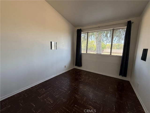1836 E Walnut Crk, West Covina, CA 91791 - empty room featuring vaulted ceiling and baseboards