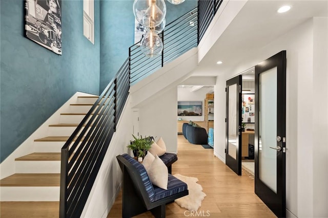2301 Santiago Dr, Newport Beach, CA 92660 - stairs with wood finished floors and recessed lighting