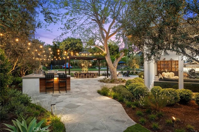 2301 Santiago Dr, Newport Beach, CA 92660 - view of property's community featuring a patio area and an outdoor kitchen