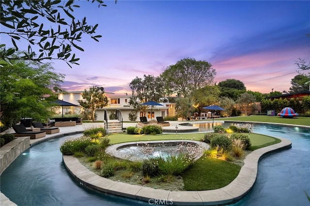 2301 Santiago Dr, Newport Beach, CA 92660 - view of property's community featuring a pool, a patio area, and a lawn
