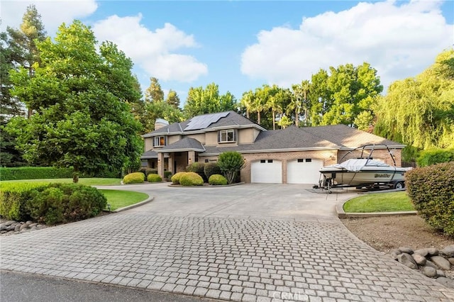 3130 Shady Grove Ct, Chico, CA 95973 - view of front of property featuring curved driveway and an attached garage