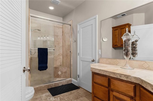 3130 Shady Grove Ct, Chico, CA 95973 - bathroom featuring a stall shower, vanity, tile patterned flooring, and recessed lighting