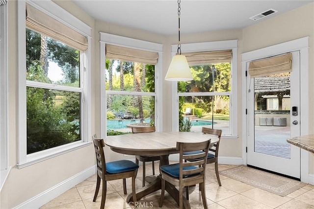 3130 Shady Grove Ct, Chico, CA 95973 - dining space with light tile patterned flooring and healthy amount of natural light