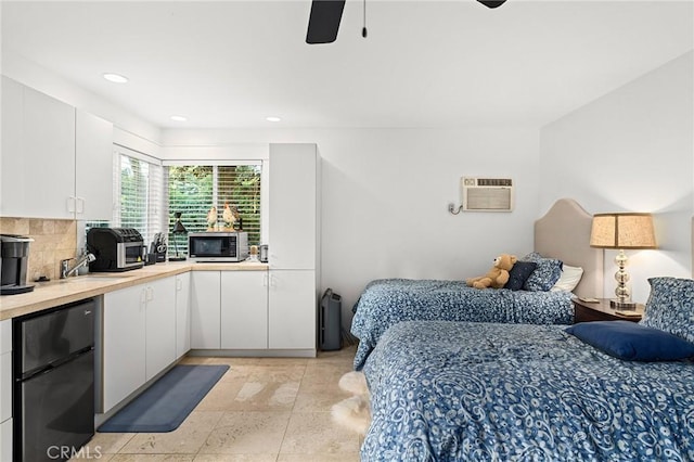 3130 Shady Grove Ct, Chico, CA 95973 - bedroom with a wall unit AC, recessed lighting, freestanding refrigerator, and ceiling fan