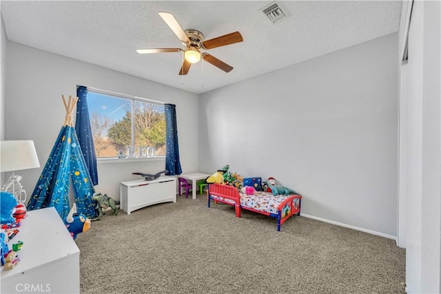 6231 Almond Valley Way, Quartz Hill, CA 93536 - playroom with carpet flooring, a ceiling fan, and a textured ceiling