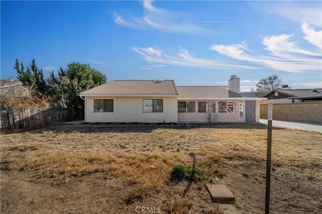 6231 Almond Valley Way, Quartz Hill, CA 93536 - ranch-style house with a tile roof, stucco siding, and a chimney