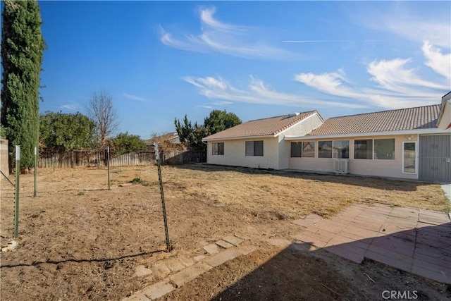 6231 Almond Valley Way, Quartz Hill, CA 93536 - rear view of house featuring a tiled roof