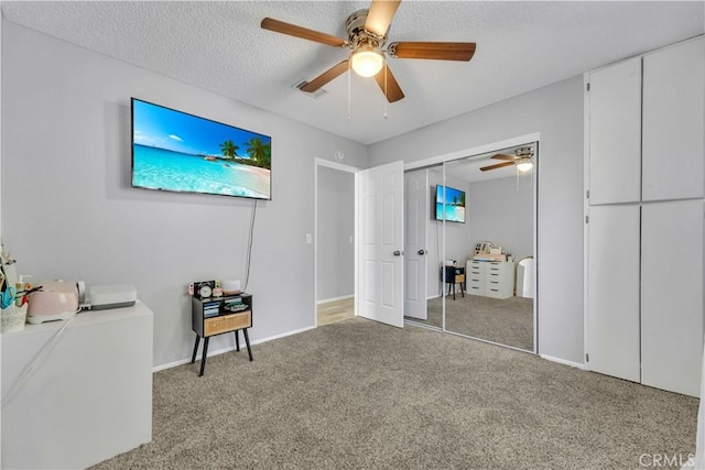 6231 Almond Valley Way, Quartz Hill, CA 93536 - bedroom with carpet floors, ceiling fan, and a textured ceiling