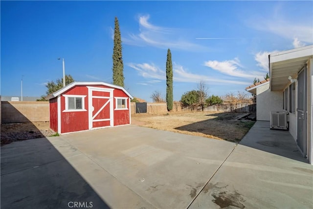 6231 Almond Valley Way, Quartz Hill, CA 93536 - fenced backyard with a storage shed and a patio area