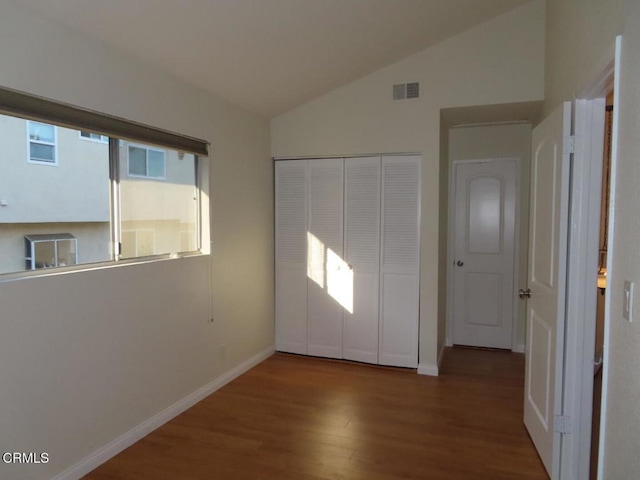 808 Magnolia Ave Unit 3, Pasadena, CA 91106 - unfurnished bedroom featuring wood finished floors, vaulted ceiling, and a closet