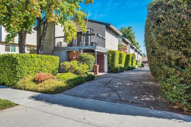 808 Magnolia Ave Unit 3, Pasadena, CA 91106 - view of home's exterior with a balcony and stucco siding
