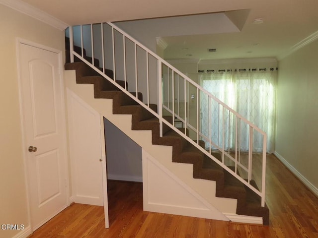 808 Magnolia Ave Unit 3, Pasadena, CA 91106 - stairs featuring ornamental molding and wood finished floors