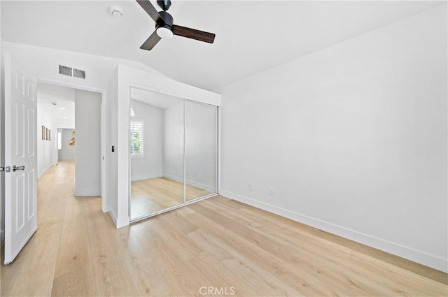 575 E Nubia St, Covina, CA 91722 - unfurnished bedroom featuring lofted ceiling, light wood-style floors, a closet, and a ceiling fan