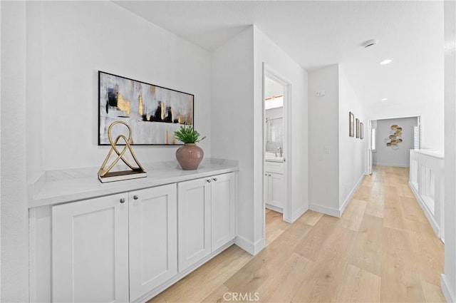 575 E Nubia St, Covina, CA 91722 - hallway with light wood-style floors and recessed lighting
