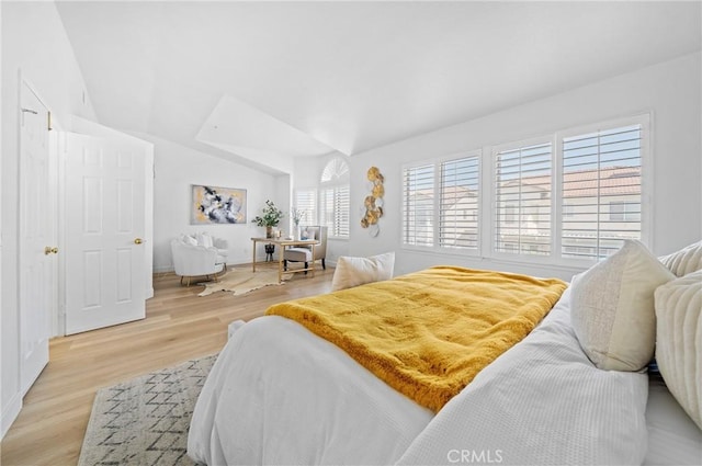 575 E Nubia St, Covina, CA 91722 - bedroom featuring light wood-style flooring and lofted ceiling
