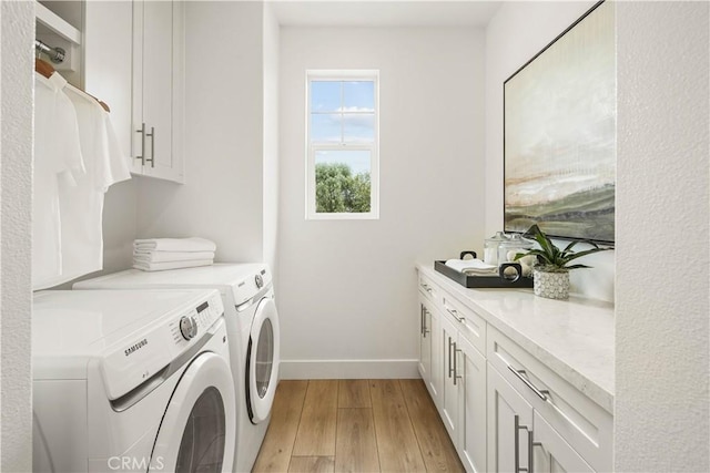 4836 Arroyo Run, Moorpark, CA 93021 - laundry room featuring cabinet space, independent washer and dryer, and light wood finished floors
