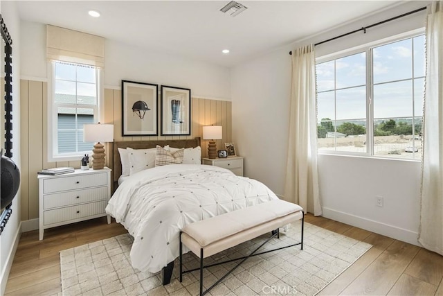 4836 Arroyo Run, Moorpark, CA 93021 - bedroom featuring multiple windows, light wood-style floors, and recessed lighting