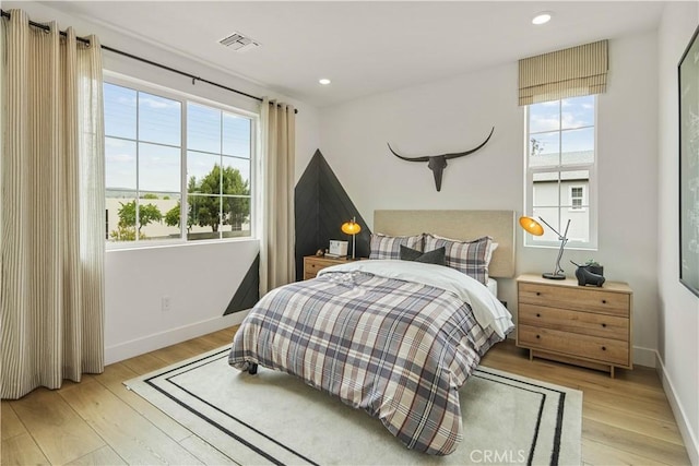 4836 Arroyo Run, Moorpark, CA 93021 - bedroom with multiple windows, light wood-type flooring, and recessed lighting