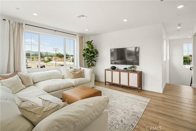 4836 Arroyo Run, Moorpark, CA 93021 - living room featuring light wood finished floors and recessed lighting